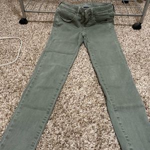 Olive green skinny stretch jeans